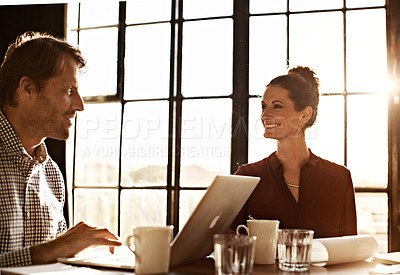 Buy stock photo Shot of a couple working together at home