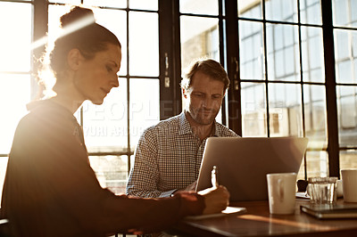 Buy stock photo Shot of a couple working together at home