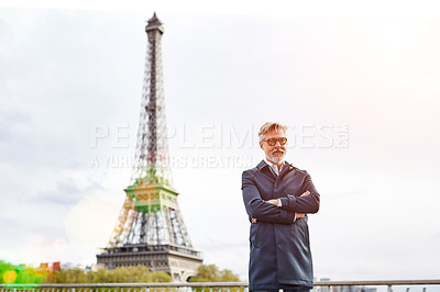 Buy stock photo Portrait of a handsome mature man with the Eiffel Tower in the background
