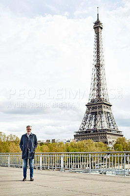 Buy stock photo Portrait of a handsome mature man with the Eiffel Tower in the background
