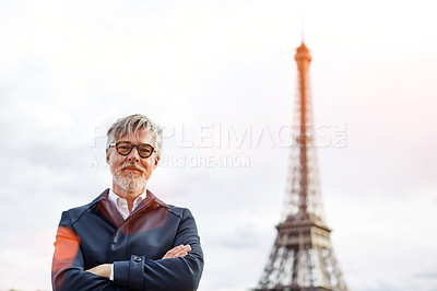 Buy stock photo Portrait of a handsome mature man with the Eiffel Tower in the background