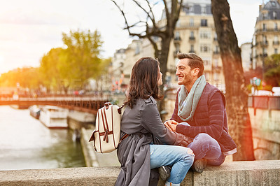 Buy stock photo Shot of a happy young couple enjoying a day together in Paris
