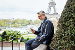 Planning his day in Paris