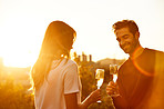 Sharing champagne under the setting sun