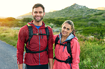 Buy stock photo Portrait of a two smiling friends out for a run together on a cool morning