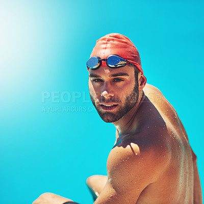Buy stock photo Portrait of an athletic young man in swimwear sitting by the edge of a swimming pool