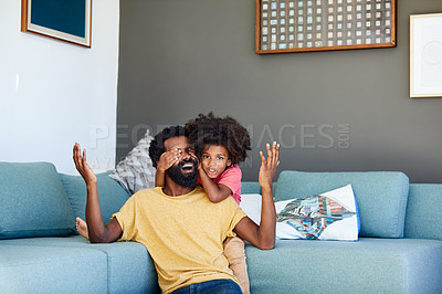 Buy stock photo Shot of a cheerful little boy holding his father's eyes closed from behind as a surprise at home