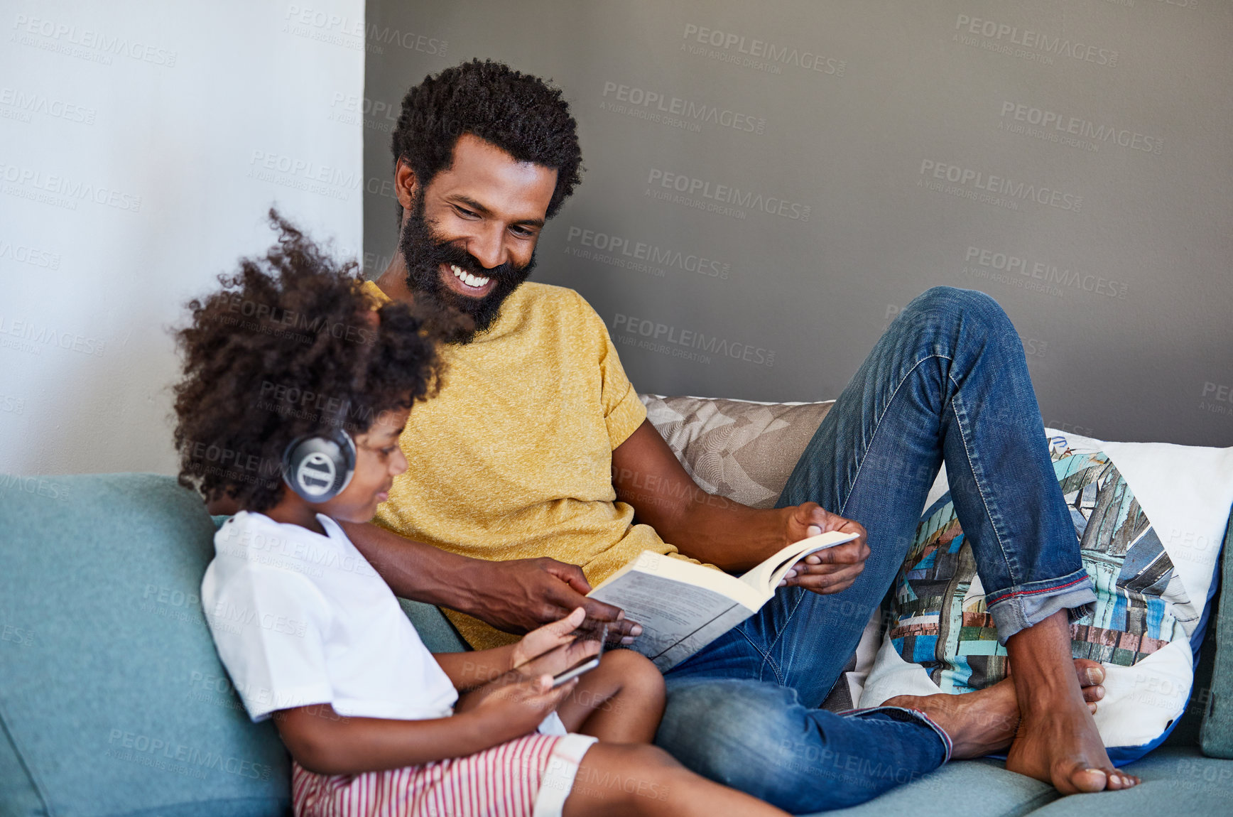 Buy stock photo Book, relax and tablet of boy with father on living room sofa together for online gaming or reading. Break, story and video game with black family in apartment for hobbies, love or weekend bonding