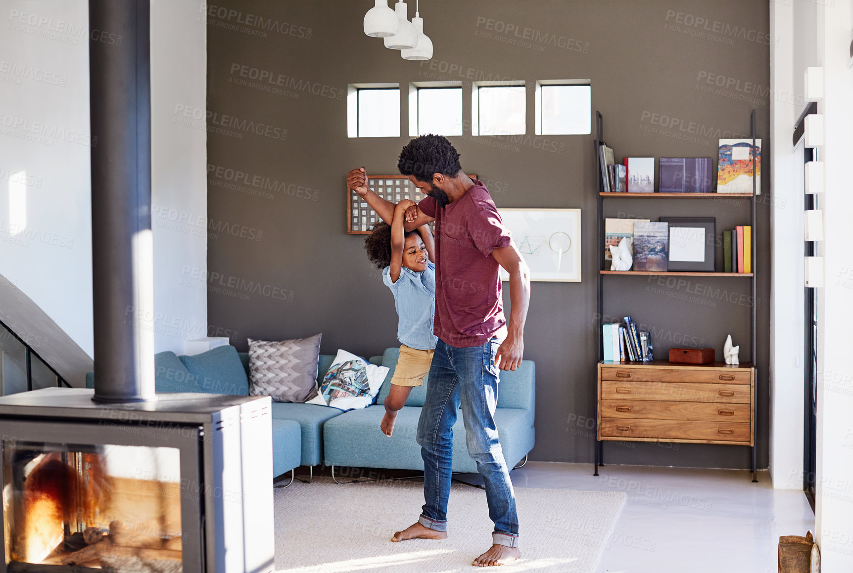 Buy stock photo Games, father and child with hanging in house, bonding and connection with strong dad in lounge. Black man, boy and muscle for fun with happiness together, playful and quality time in family home