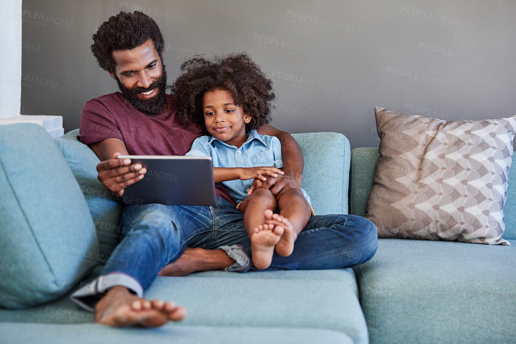 Buy stock photo Dad, child and tablet on home couch for internet connection, education game or elearning. Man, son or black family reading together in lounge with technology for kids video, knowledge quiz or happy