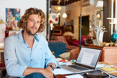 Buy stock photo Portrait of a young man sitting at his desk in an office