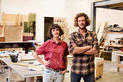 Buy stock photo Cropped shot of colleagues standing in a furniture manufacturing workshop