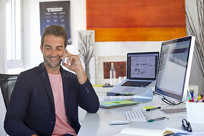 Buy stock photo Shot of a businessman using his cellphone in his office