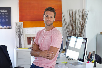 Buy stock photo Portrait of a handsome young businessman in his office