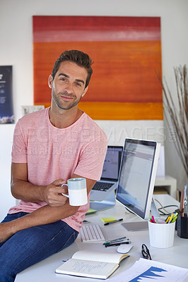 Buy stock photo Portrait of a handsome young businessman in his office