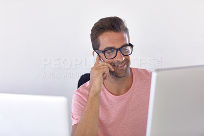 Buy stock photo Shot of a businessman using his cellphone in his office