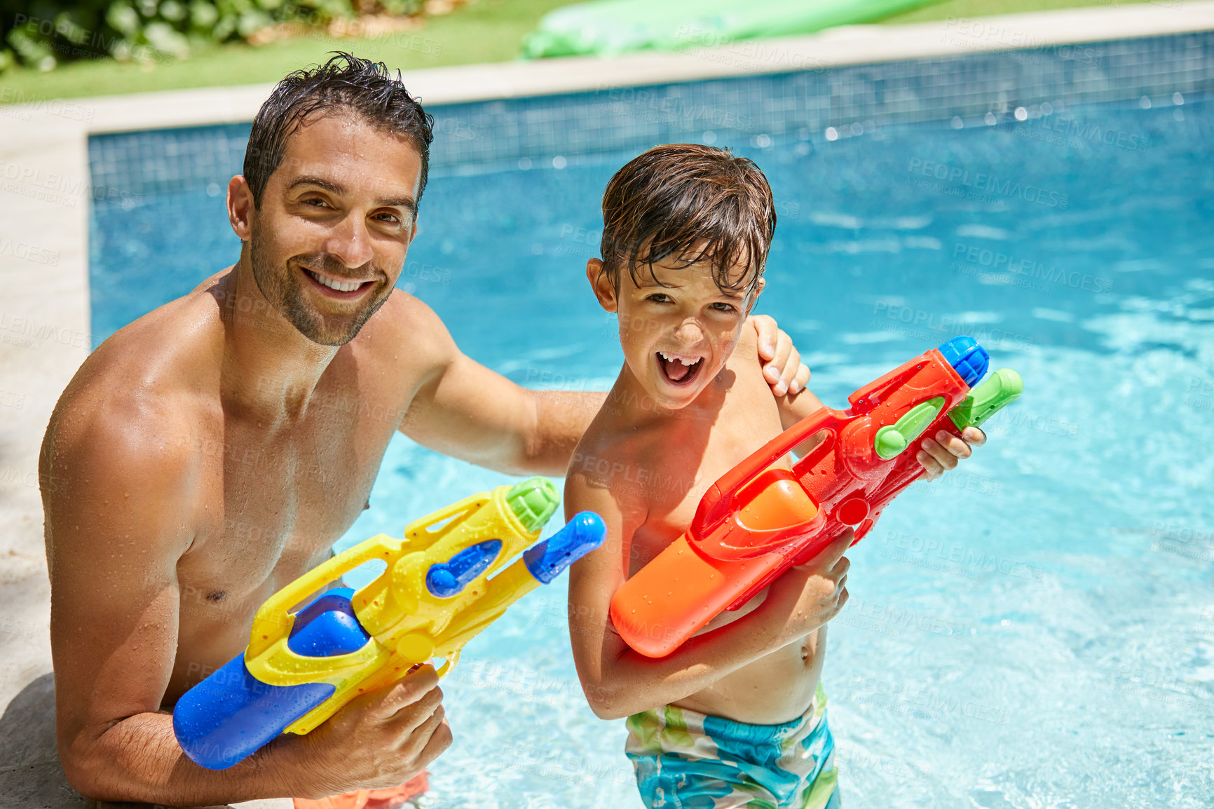 Buy stock photo Water gun, portrait and dad with son at swimming pool for bonding, together and summer vacation. Toys, excited and holiday with man and child in backyard of family home for happy, games and playful