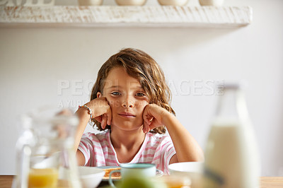 Buy stock photo Cropped shot of a little girl having breakfast at home