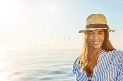 Buy stock photo Shot of a beautiful young woman going for an ocean cruise on a boat