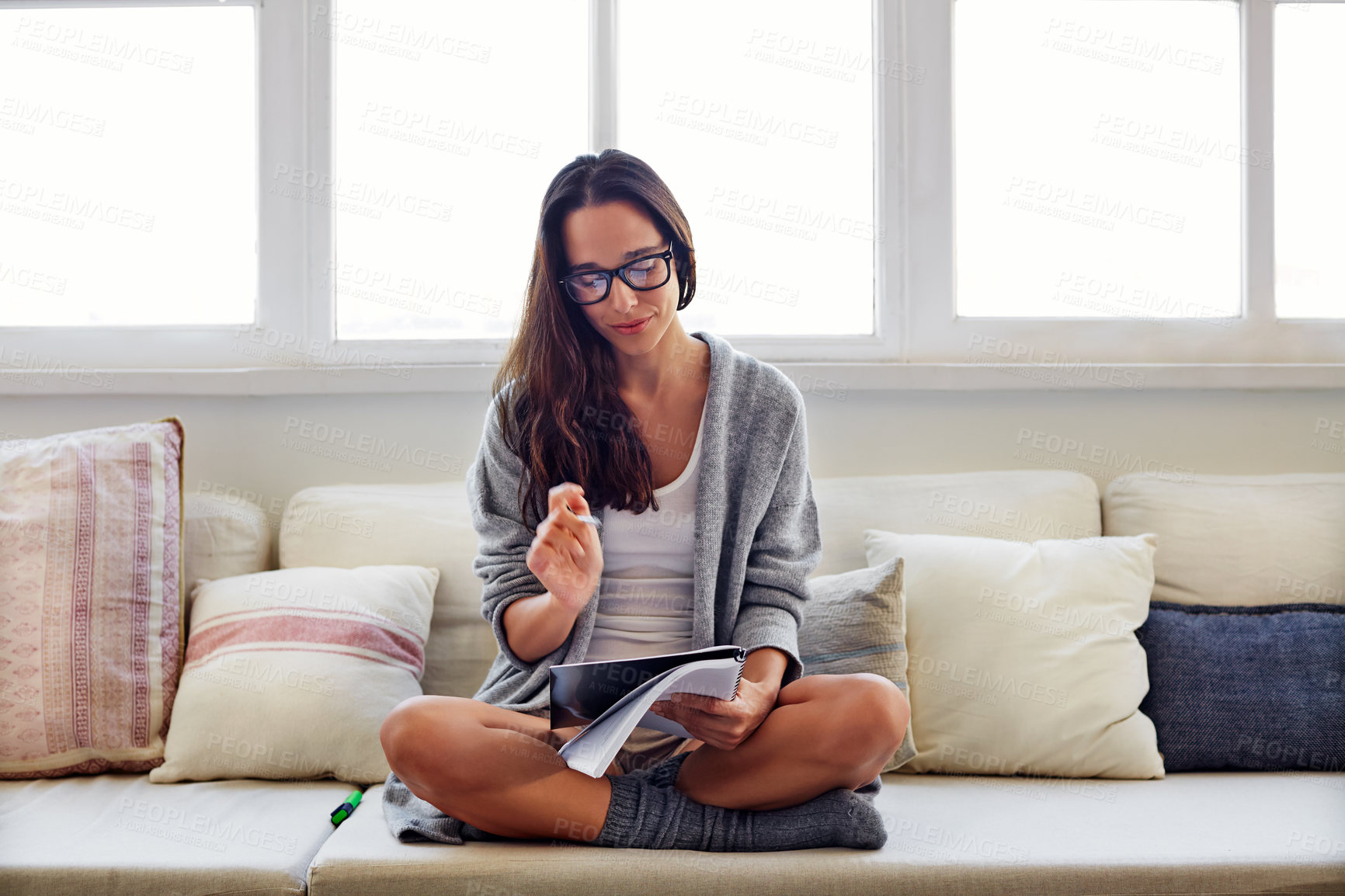 Buy stock photo Thinking, smile and woman on sofa with notebook for writing ideas, inspiration and brainstorming. Living room, journal and person with diary for mindfulness, reflection and creative planning in home