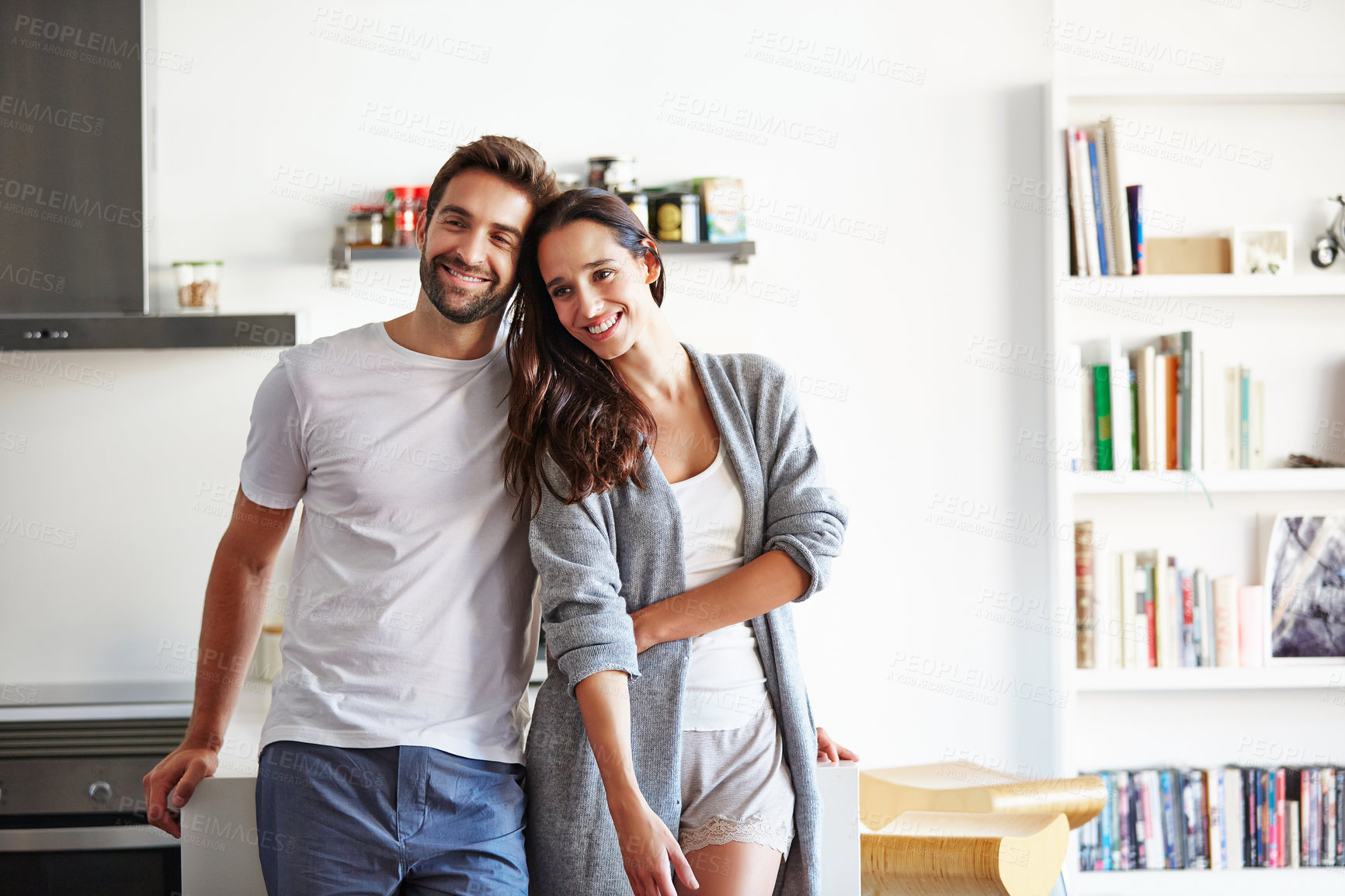 Buy stock photo Shot of an affectionate young couple spending time together in the morning at home