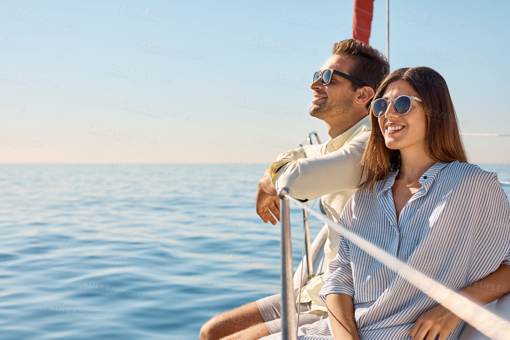 Buy stock photo Happy, yacht and couple in ocean for summer vacation, holiday and relax on honeymoon together. Thinking, marriage and man and woman on boat for adventure space, cruise or tourism for bonding and love