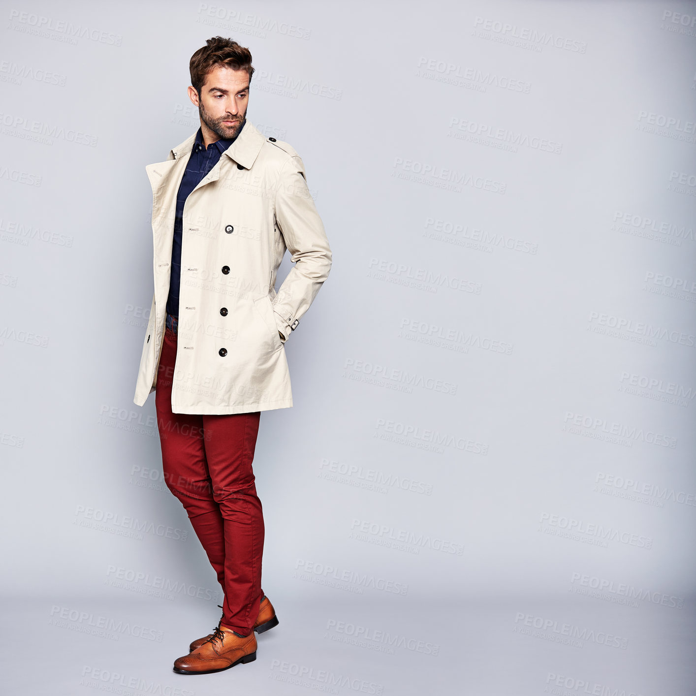 Buy stock photo Man, fashion and trench coat in studio with reflection, creativity and vision for trendy aesthetic. Confident person, thinking and layer outfit with jacket, style or mockup space on white background.