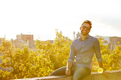 Buy stock photo Cropped shot of a man on a rooftop