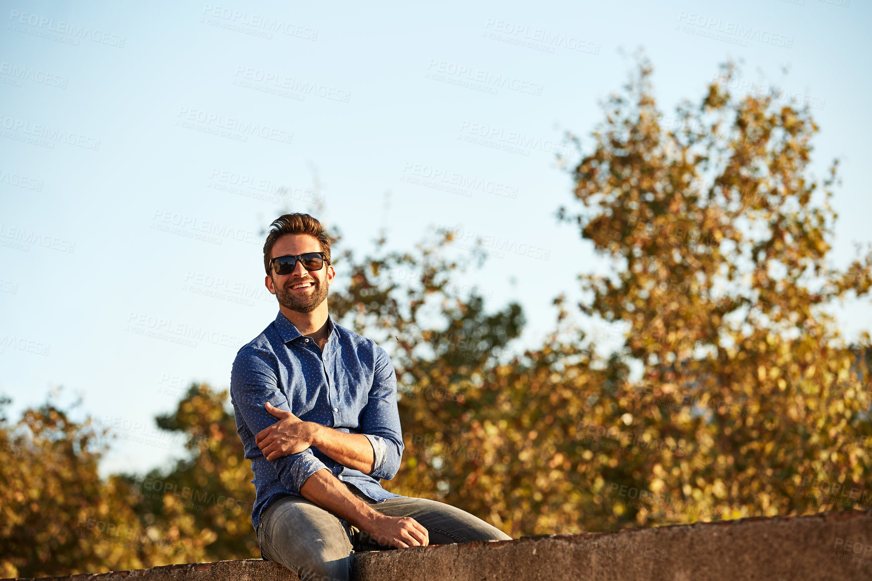 Buy stock photo Portrait, smile and sunglasses with man outdoor for summer sunset and travel vacation on weekend break. Happy, calm and holiday with person in nature for wellness, peace and tourism with space