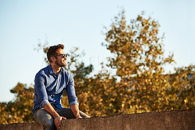Buy stock photo Cropped shot of a man on a rooftop