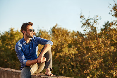 Buy stock photo Cropped shot of a man on a rooftop