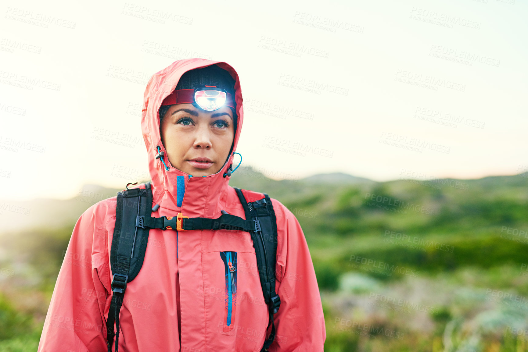 Buy stock photo Cropped shot of an attractive young female athlete out for a morning run
