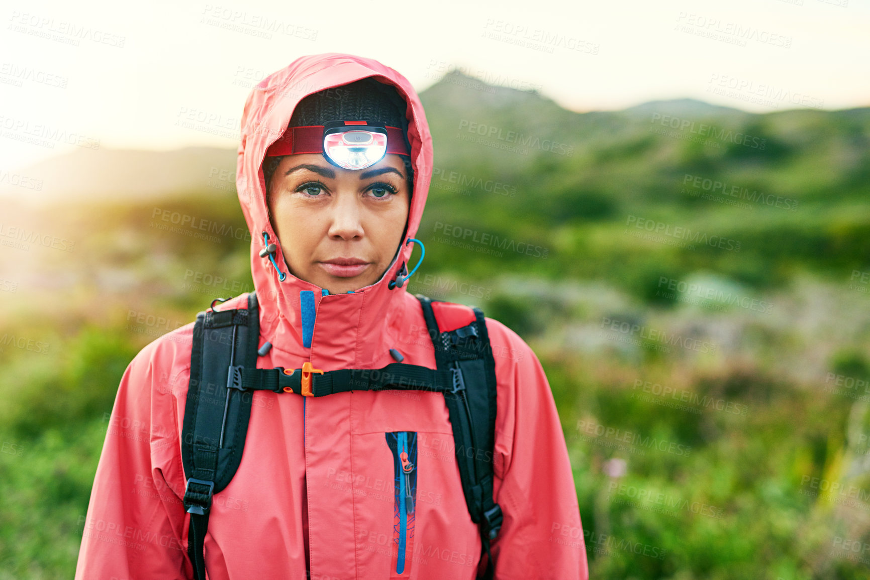 Buy stock photo Cropped shot of an attractive young female athlete out for a morning run
