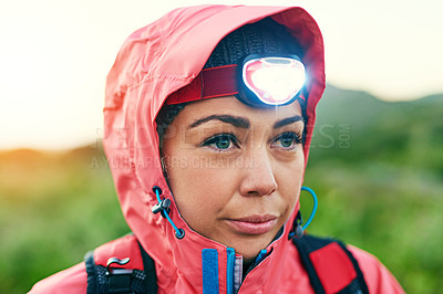 Buy stock photo Cropped shot of an attractive young female athlete out for a morning run