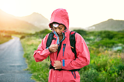 Buy stock photo Cropped shot of an attractive young female athlete out for a morning run