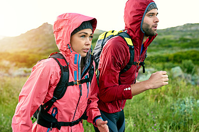 Buy stock photo Cropped shot of a young couple out for a morning run