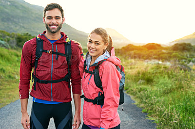 Buy stock photo Cropped portrait of an affectionate young couple out for a morning run