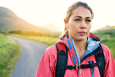 Buy stock photo Cropped shot of an attractive young female athlete out for a morning run
