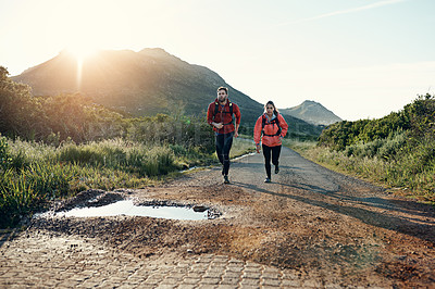 Buy stock photo Full length shot of a young couple out for a morning run