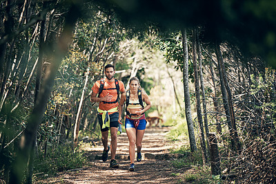 Buy stock photo Full length shot of a young athletic couple out for their morning run