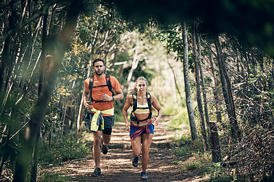 Buy stock photo Full length shot of a young athletic couple out for their morning run
