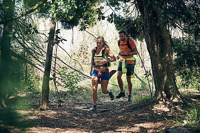 Buy stock photo Full length shot of a young athletic couple out for their morning run