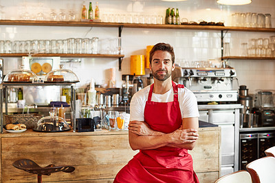Buy stock photo Portrait of a male barista on duty in a coffee shop