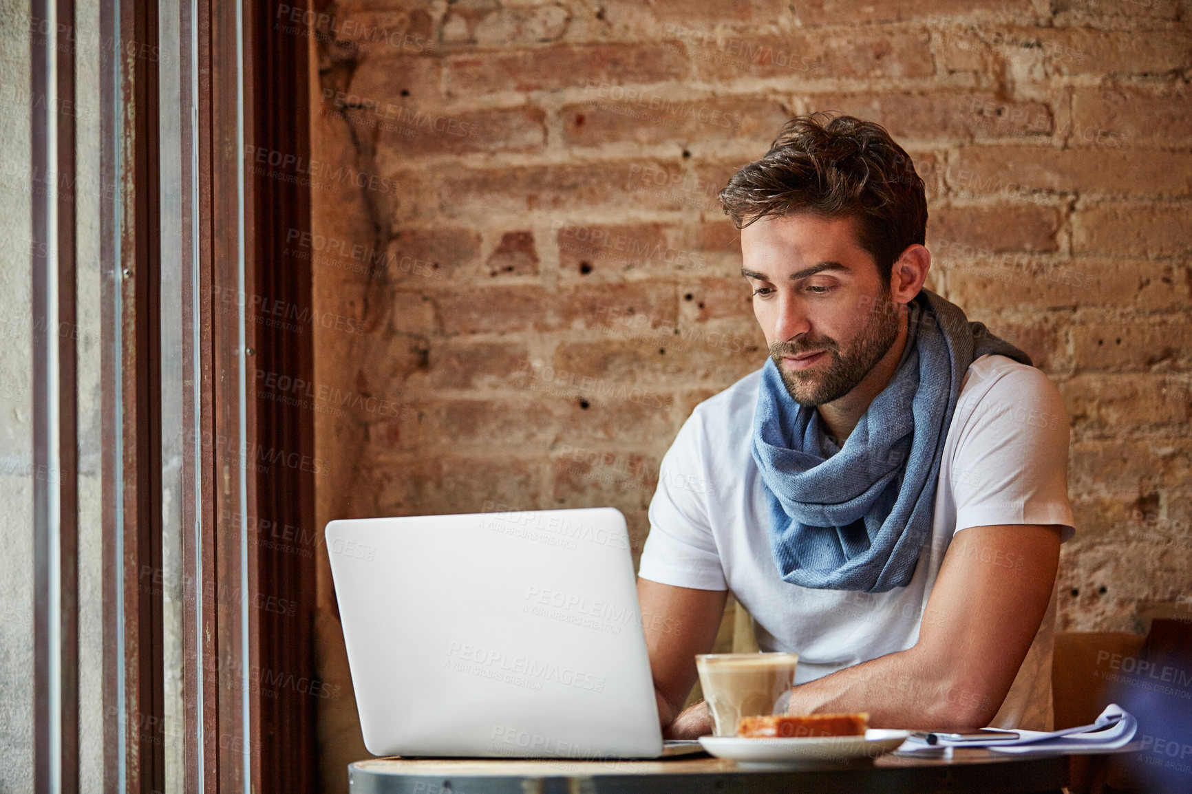 Buy stock photo Freelancer, lunch and man with laptop in coffee shop, paid advertising and content strategy on web. Digital marketing, remote work and person with food, online and research with technology in cafe