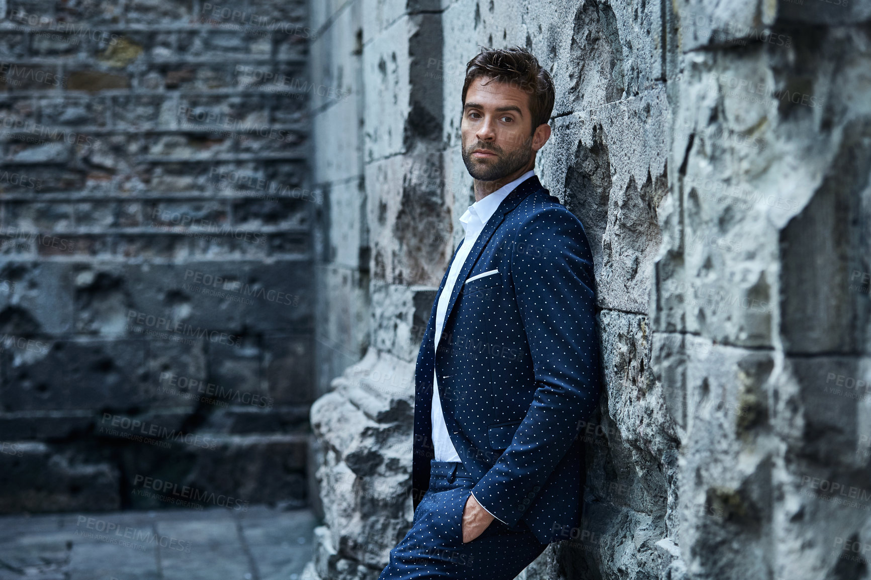 Buy stock photo Fashion, thinking and man in city by wall for elegant outfit, commute and confidence outdoor. Travel, town and person with formal style for reflection, pride and serious for outing, trip or event