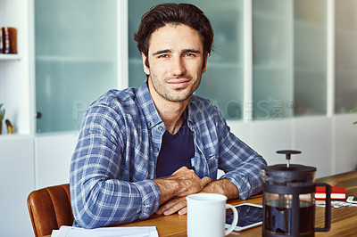 Buy stock photo Portrait of handsome young man working from home
