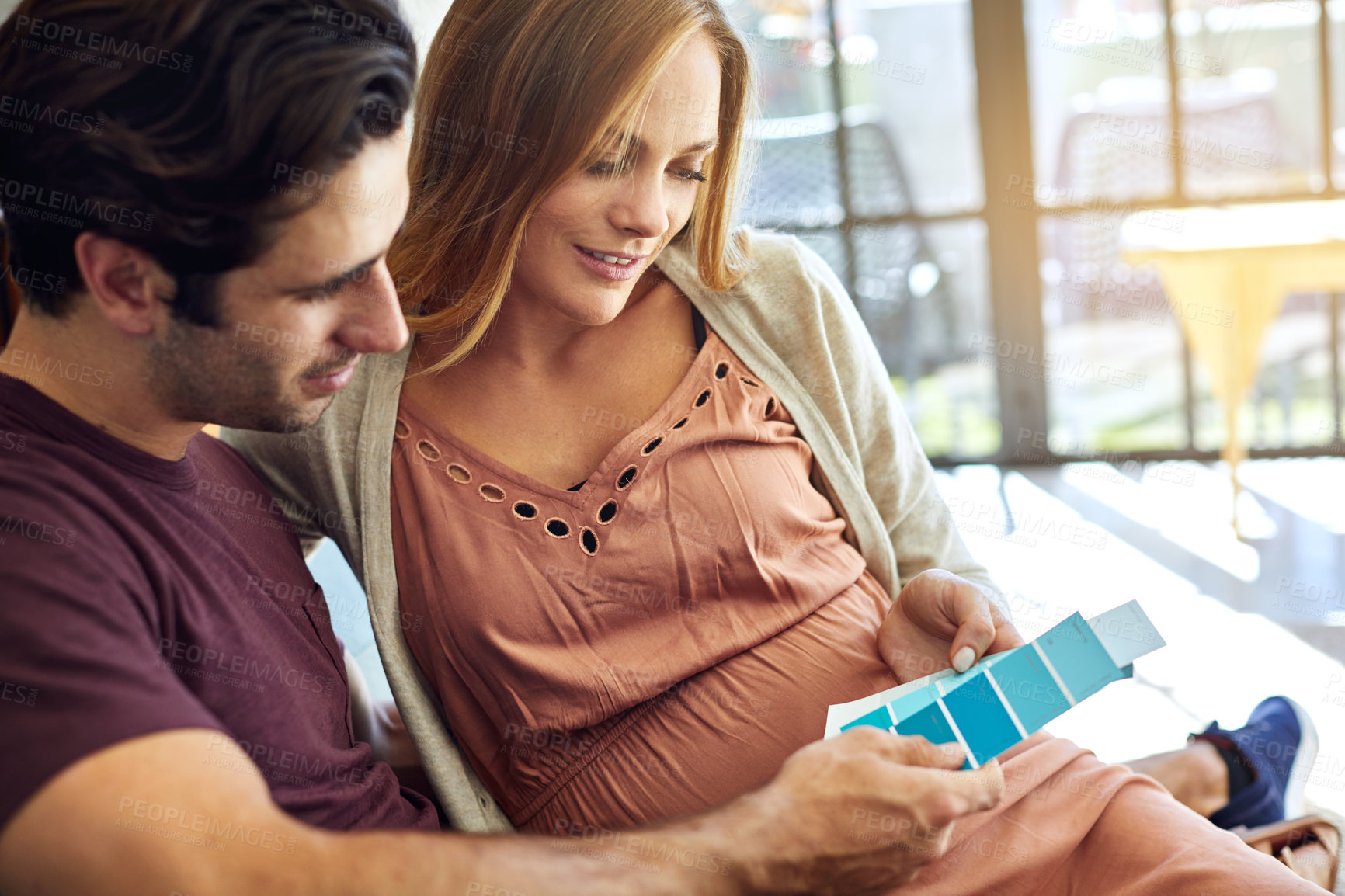 Buy stock photo Pregnancy, couple or talk with swatches for renovation planning, nursery interior or color choice. People, future parents or chat with palette, tone decision or blue paint for baby room decor in home