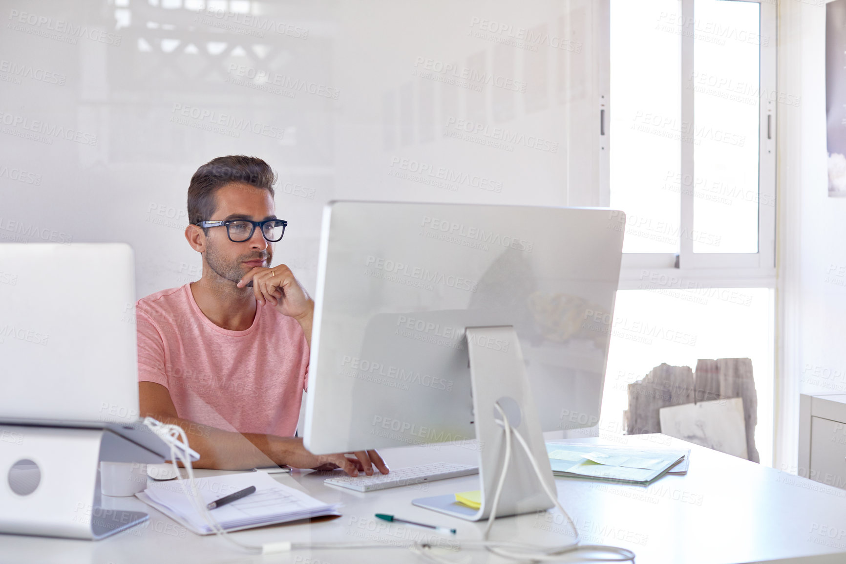 Buy stock photo Creative, glasses and man with computer in business, research and graphic designer with assignment. Happy, employee and person with technology, online and review design project and brand identity