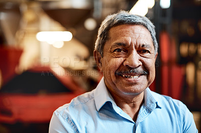 Buy stock photo Shot of a confident mature man working in a factory