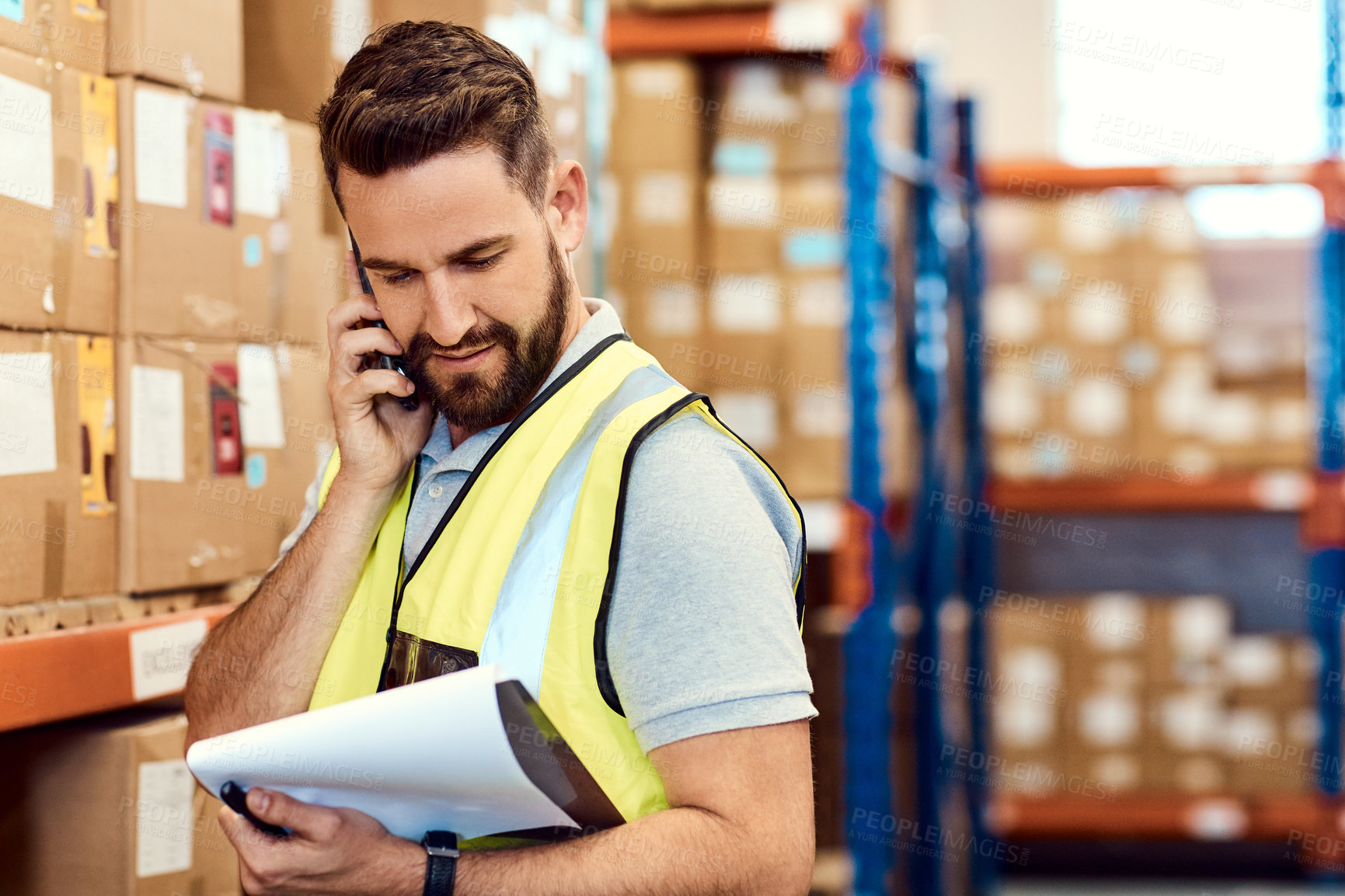 Buy stock photo Reading, phone call and clipboard with man in warehouse for logistics, tracking code and cargo. Contact, delivery and stock update with person in factory for supplier distribution and communication